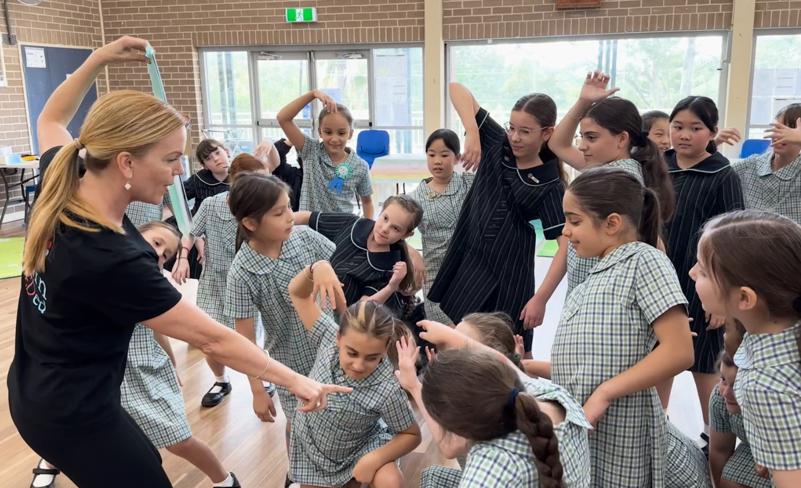Dance instructor teaching children